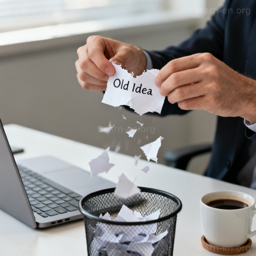 Tearing paper with Old Idea into wastebasket