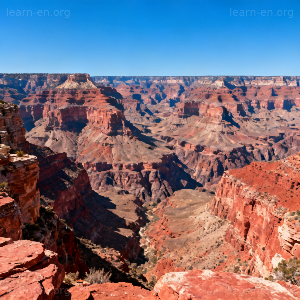 Immense size depicted by the vast, breathtaking expanse of the Grand Canyon.